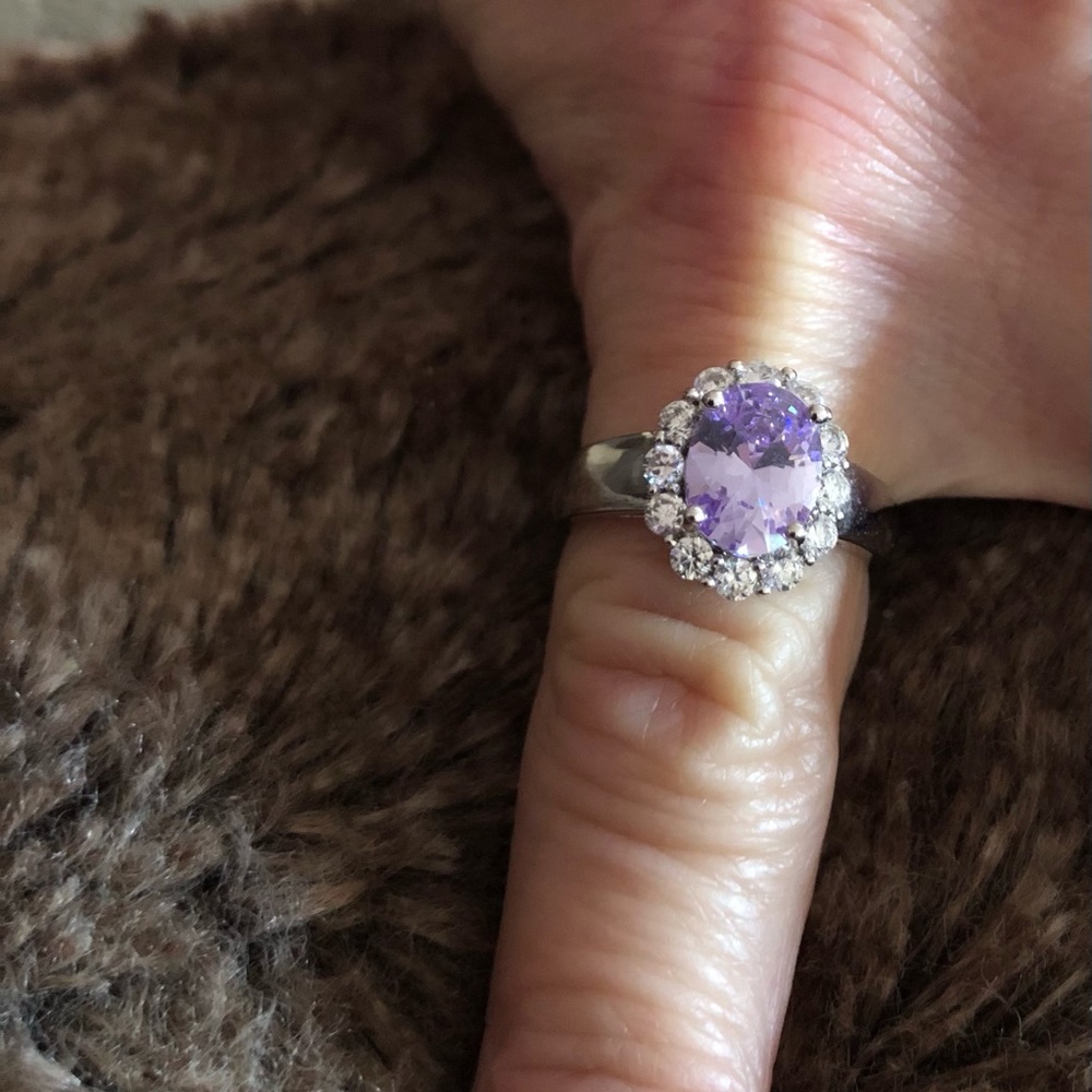 New sterling silver tanzanite ring with crystal hallo. Size 7